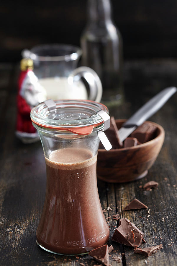 Homemade Chocolate Liqueur With Cocoa, Cream, Honey And Rum #1 Photograph by Teubner Foodfoto