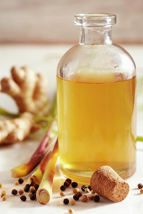 Homemade Lemongrass Vinegar With Ginger, Mustard And Cilantro #1 Photograph by Teubner Foodfoto