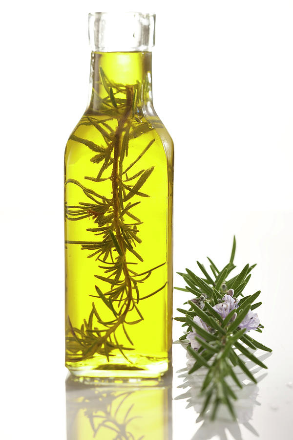 Homemade Rosemary Oil Photograph by Teubner Foodfoto - Fine Art America