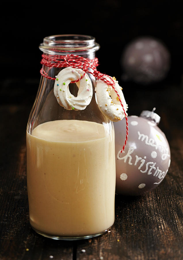 Homemade White Chocolate Liqueur Decorated With Meringue Rings #1 Photograph by Teubner Foodfoto