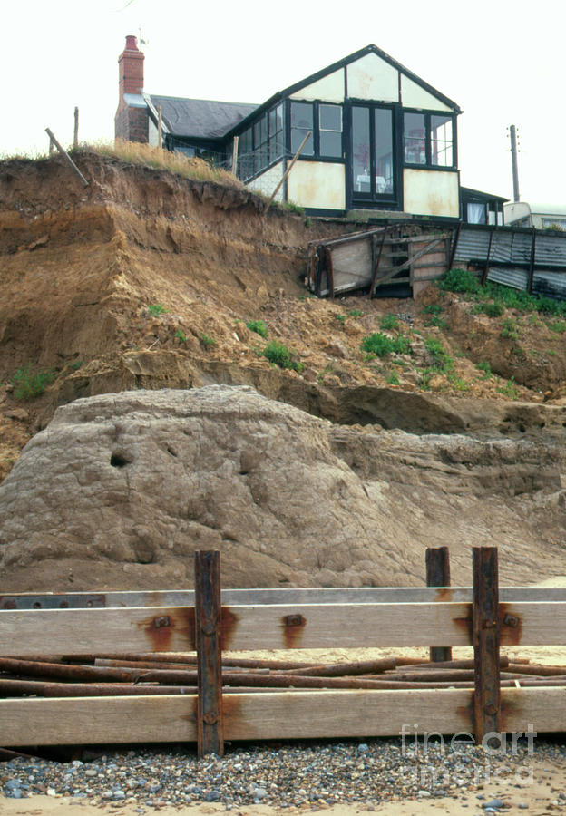 House Located At The Edge Of A Sea Eroded Cliff #1 Photograph by Graeme Ewens/science Photo Library