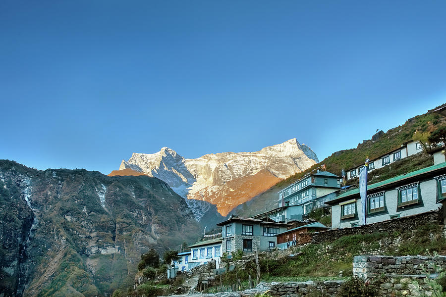 Houses and surrounding mountains in Namche Bazaar, Nepal #1 Photograph by Marek Poplawski