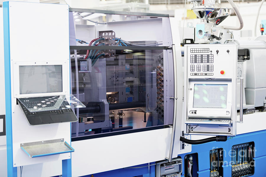 Machine Photograph - Hydraulic Injection Moulding Machine by Microgen Images/science Photo Library Machine Photograph - Hydraulic Injection Moulding Machine by Microgen Images/science Photo Library
