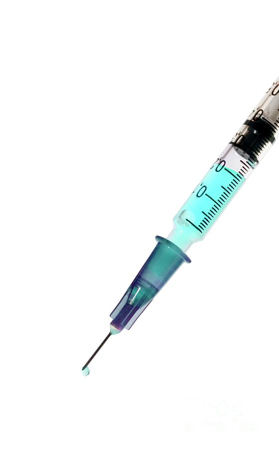 Hypodermic Syringe Filled With Colourful Liquid #1 Photograph by Photostock-israel/science Photo Library