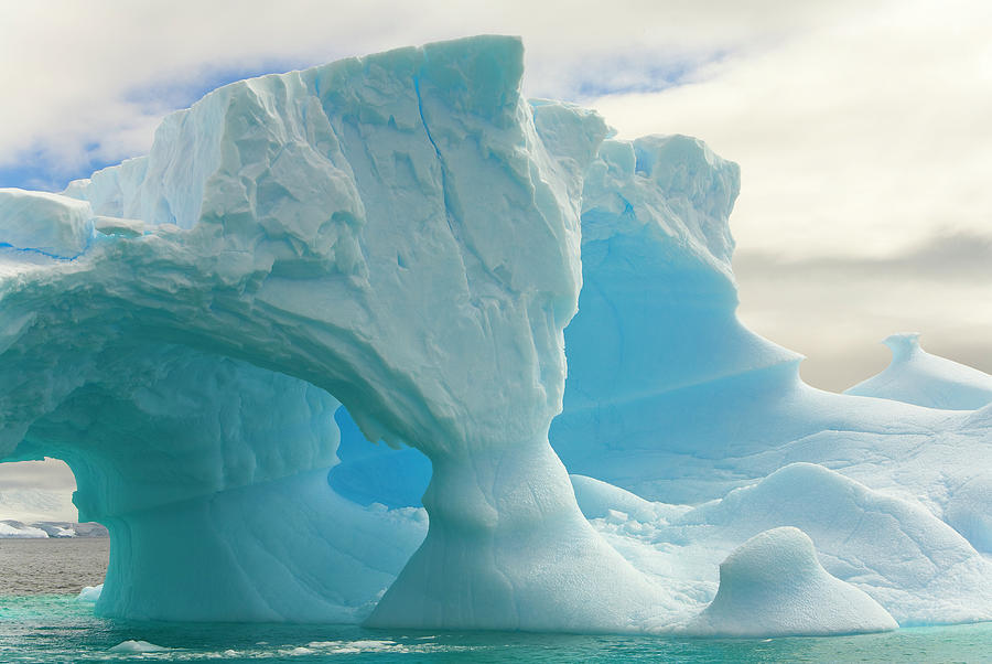 Iceberg With Arches, Antarctic Peninsula Photograph by Eastcott Momatiuk