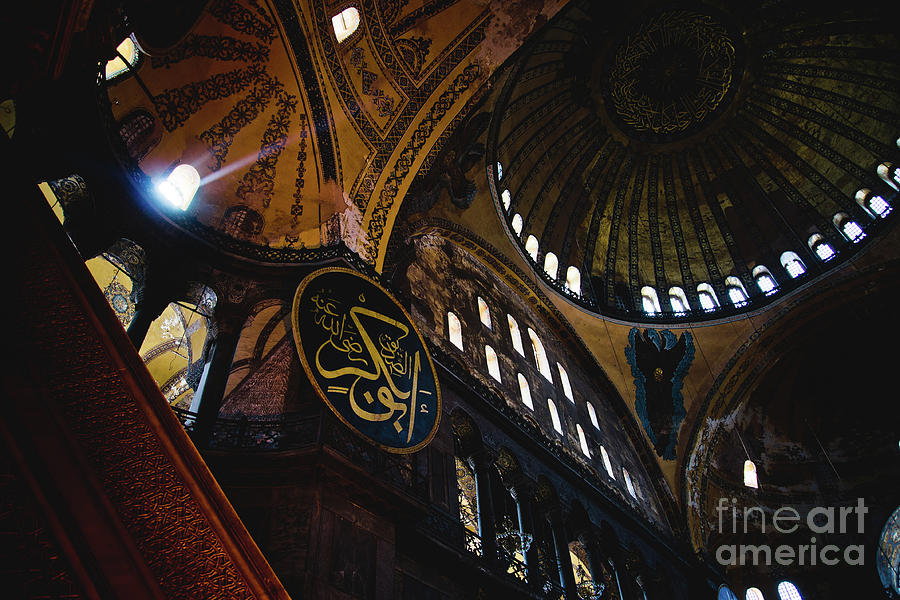 Interior of the historic Basilica of Saint Sophia, mosque for the most visited Muslim cult in Istanbul. #1 Photograph by Joaquin Corbalan