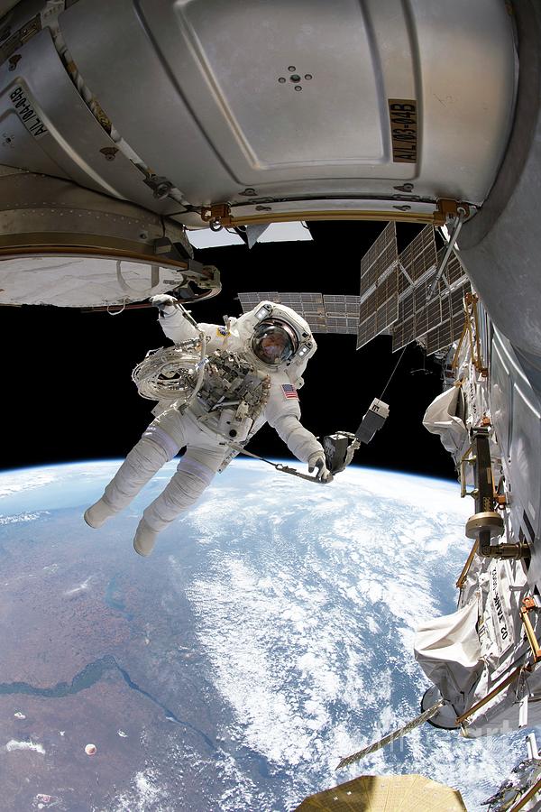 Iss Spacewalk #1 Photograph by Nasa/science Photo Library