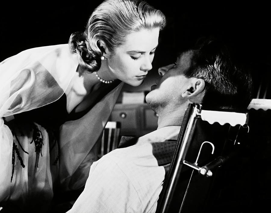 JAMES STEWART and GRACE KELLY in REAR WINDOW -1954-. #1 Photograph by Album