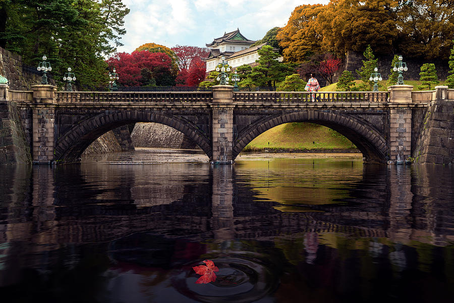 Japanese lady in Kimono dress stand on stone bridge in Imperial  #1 Photograph by Anek Suwannaphoom