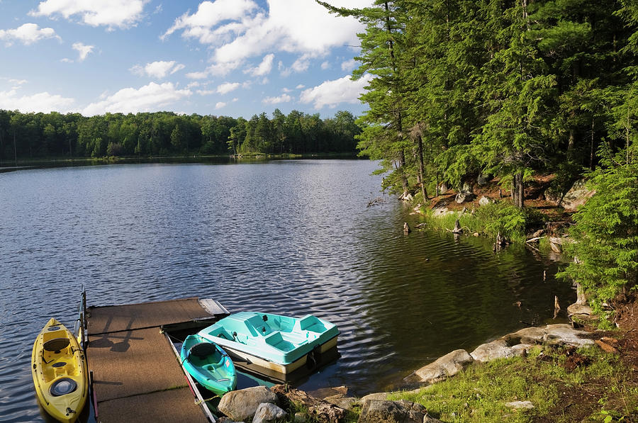 Kayaks And Paddle Boat Tied To Dock On Lake, Quebec, Canada Digital Art ...