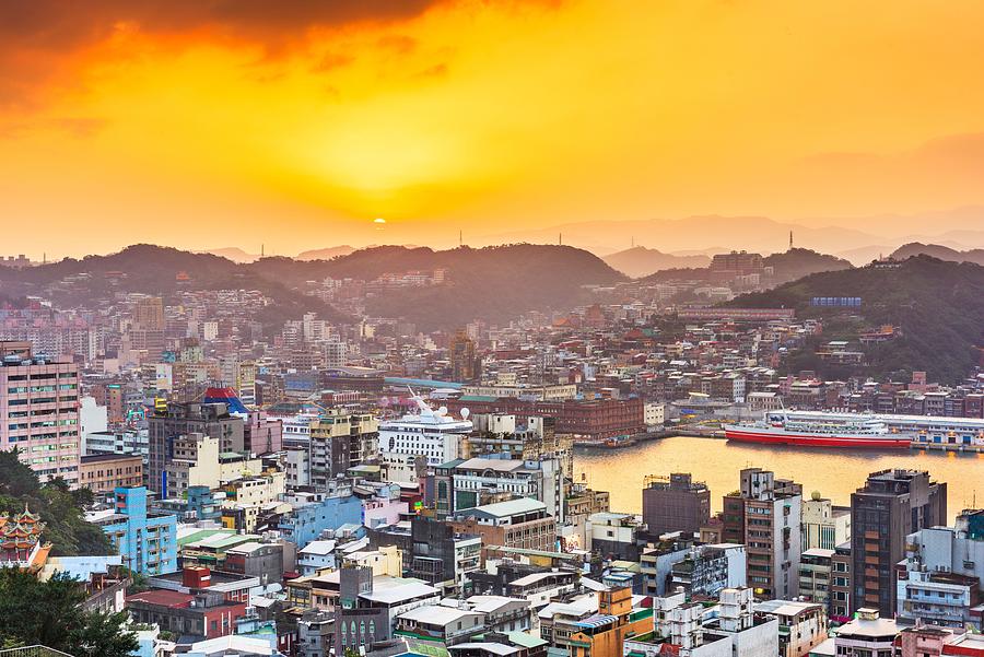 Sunset Photograph - Keelung, Taiwan Downtown City Skyline #1 by Sean Pavone