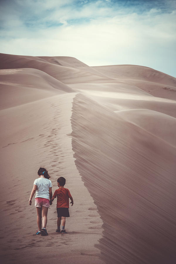 Kids at the dunes #1 Photograph by Mati Krimerman