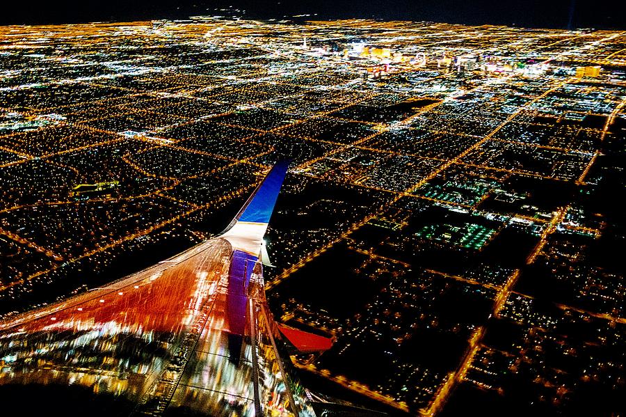 Las Vegas City lights from airplane at night #1 Photograph by Alex Grichenko