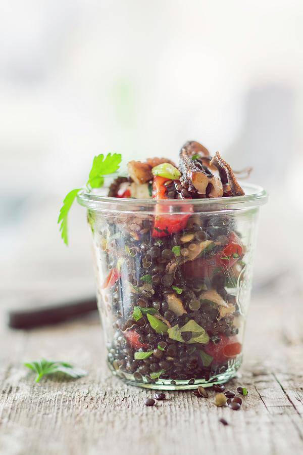 Lentil Salad With Octopus In A Glass Jar #1 Photograph by Jan Wischnewski