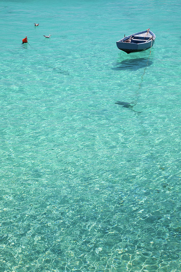 Lone Boat In Crystal Water #1 Photograph by Photovideostock