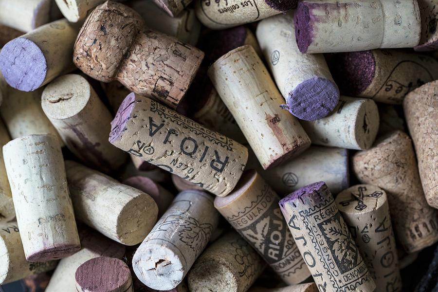 Lots Of Wine Corks seen From Above #1 Photograph by Nicole Godt