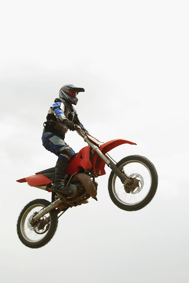 Low Angle View Of A Motocross Rider Photograph by Glowimages