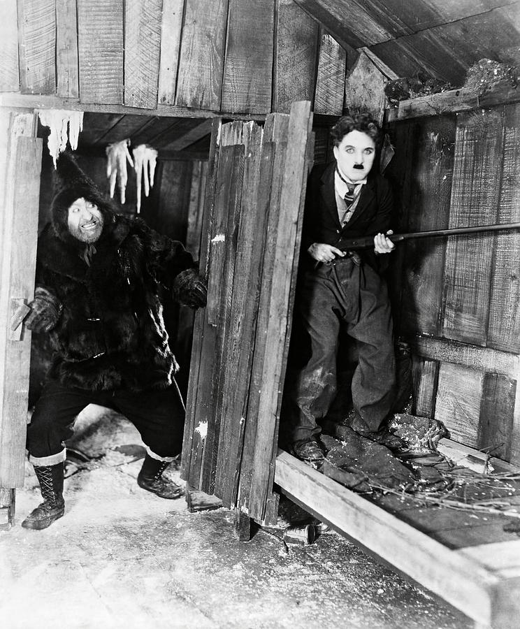MACK SWAIN and CHARLIE CHAPLIN in THE GOLD RUSH -1925-. #1 Photograph by Album