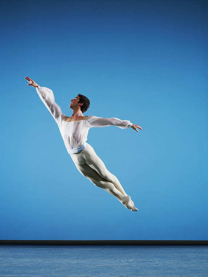 Male Ballet Dancer Leaping On Stage #1 Photograph by Thomas Barwick