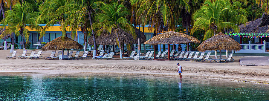Man Alone on Tropical Resort Beach #1 Photograph by Darryl Brooks