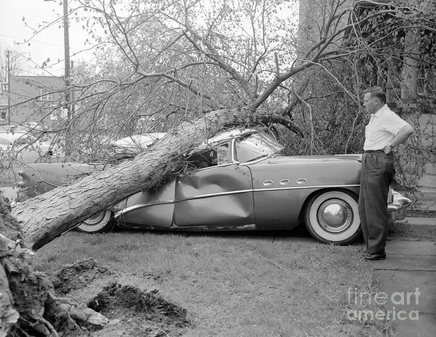Man Looking At His Damaged Car #1 Photograph by Bettmann