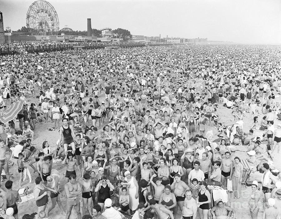 Massive Crowd On Beach At Coney Island #1 Photograph by Bettmann