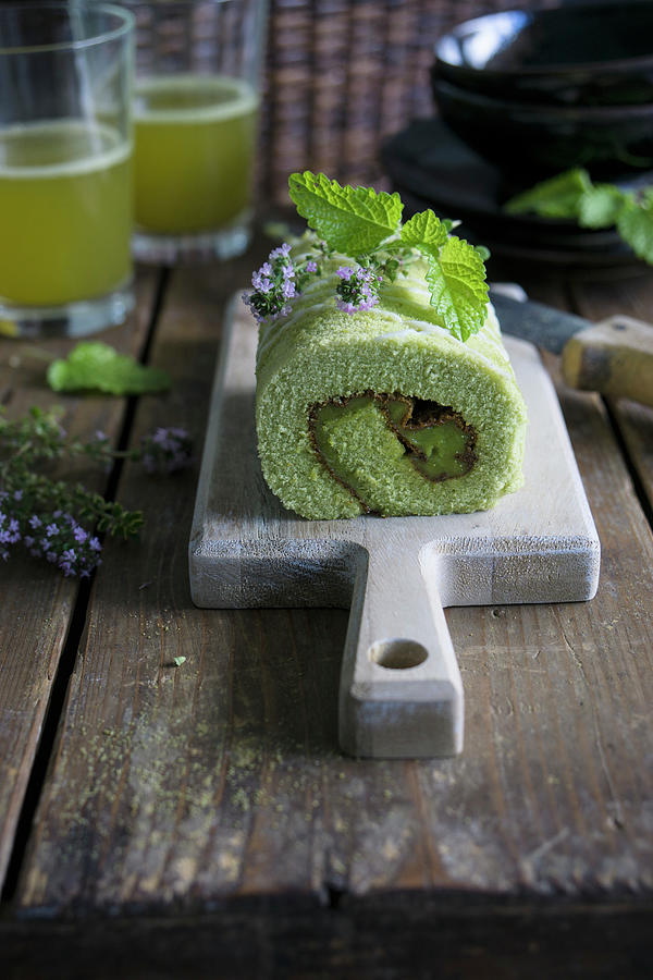 Matcha Swiss Roll filled With Matcha Cream And Red Bean Paste #1 Photograph by Martina Schindler