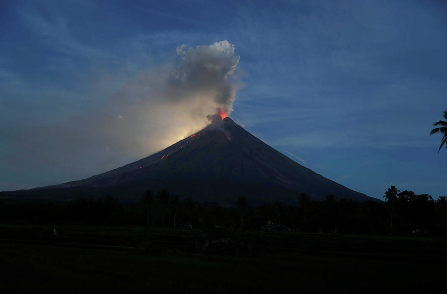 Mayon Volcano Emits Lava and Ash Photograph by Erik de Castro - Fine ...