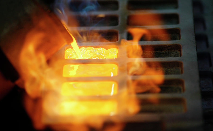 Melted Gold Flows out of a Smelter Photograph by Osman Orsal - Pixels