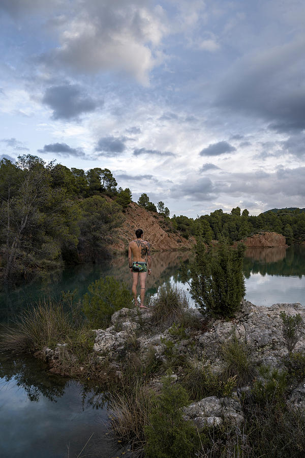 Men Fishing Near A Lake In Underwear #1 Photograph by Cavan Images