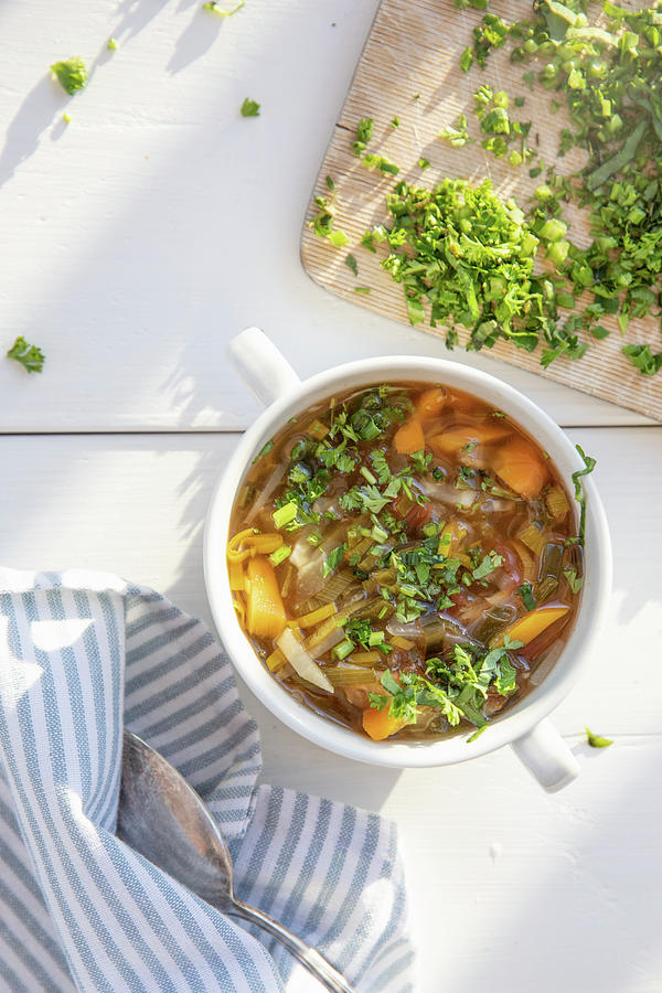 Minestrone With Fresh Herbs #1 Photograph by Claudia Timmann