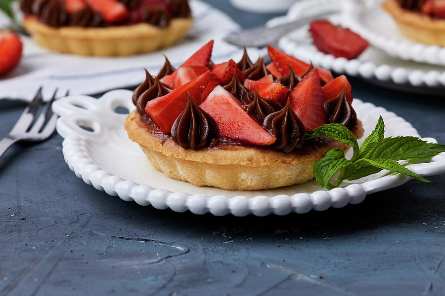 Mini Tart With Strawberry Jam, Served With Fresh Strawberries And Chocolate Ganache #1 Photograph by Natasa Dangubic