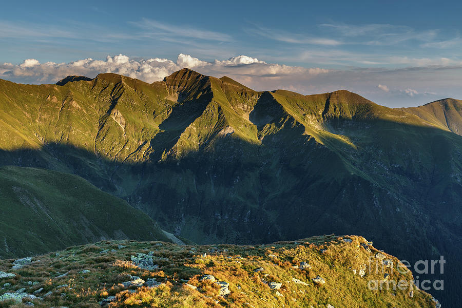 Mountain peaks at sunset by Catalin Petolea Mountain peaks at sunset by Catalin Petolea