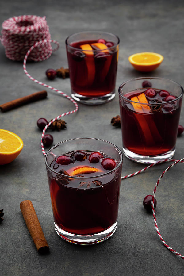 Mulled Wine With Cranberries, Cinnamon, Orange Slices And Star Anise #1 Photograph by Larissa Veronesi