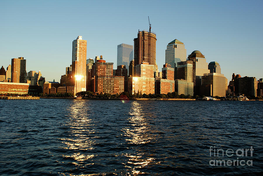 New York, USA View of Riverside Park next to the city skyline at sunset from the Hudson River. #2 Photograph by Joaquin Corbalan