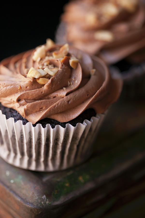 Nutella Cup Cake Garnished With Hazelnuts #1 Photograph by Yellow Street Photos