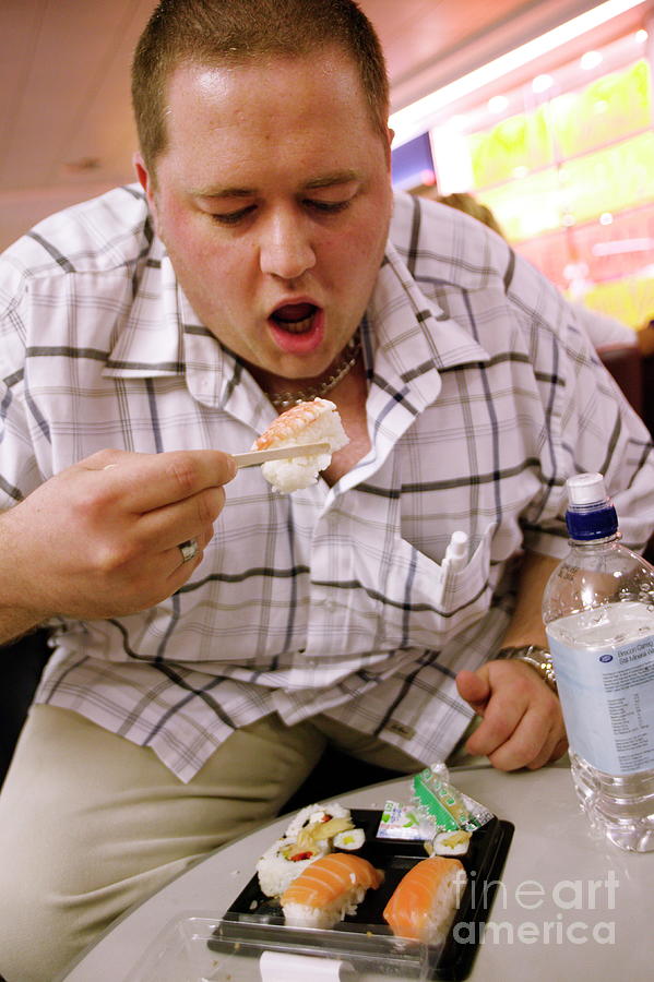 Obese Man Eating Sushi #1 Photograph by Michael Donne/science Photo Library