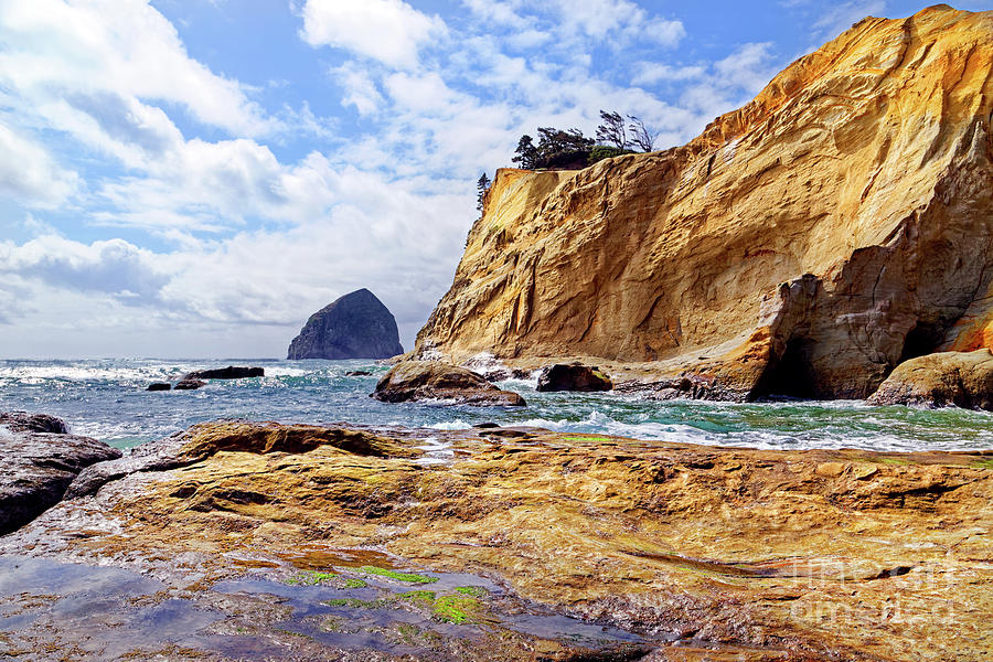 Ocean seascape rock shelf below tall orange rock cliffs Cape Kiw #2 Photograph by Robert C Paulson Jr