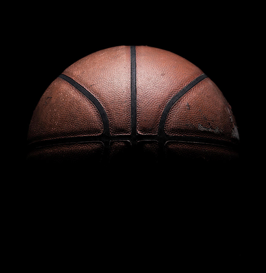 Old Used Basketball On Black #1 Photograph by Justin Lambert