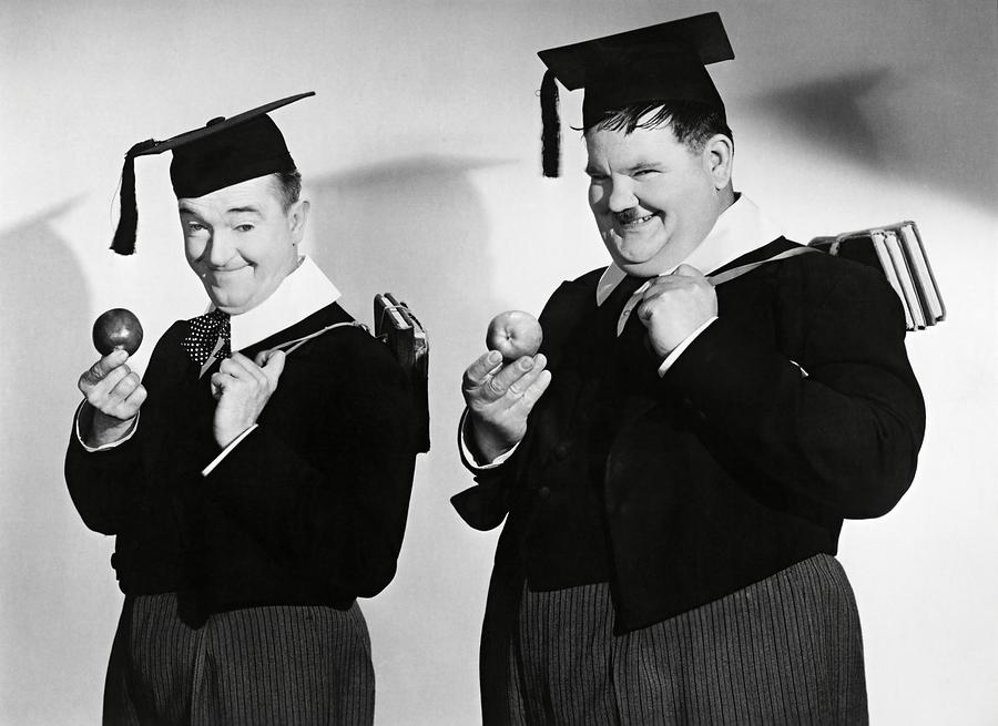 OLIVER HARDY and STAN LAUREL in A CHUMP AT OXFORD -1940-. #1 Photograph by Album