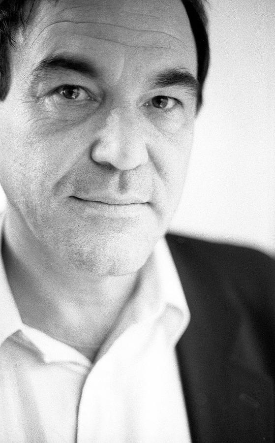 Oliver Stone London 1994 #1 Photograph by Martyn Goodacre