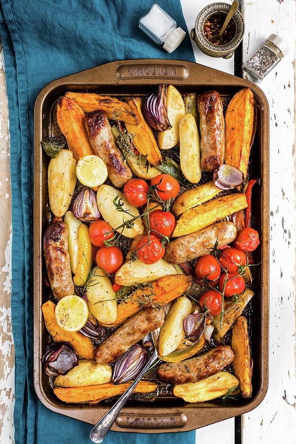 Oven Roasted Vegetables With Sausages #1 Photograph by Lucy Parissi