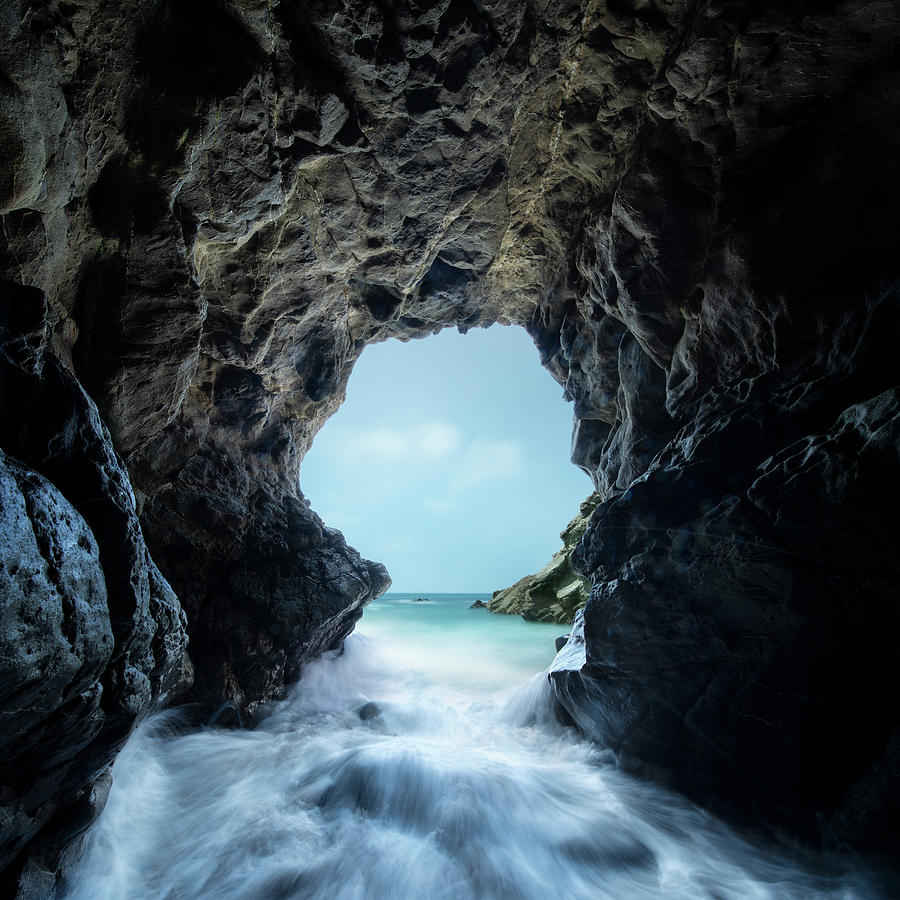 Pacific Waves Crash Through A Sea Cave At Leo Carillo State Park ...