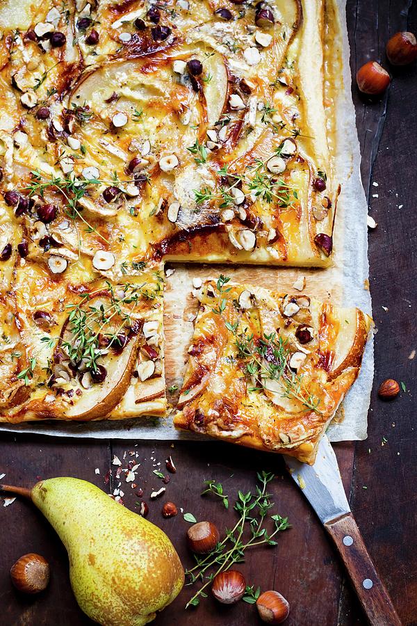 Pear And Cheese Tart With Hazelnuts Photograph by Sporrer/skowronek