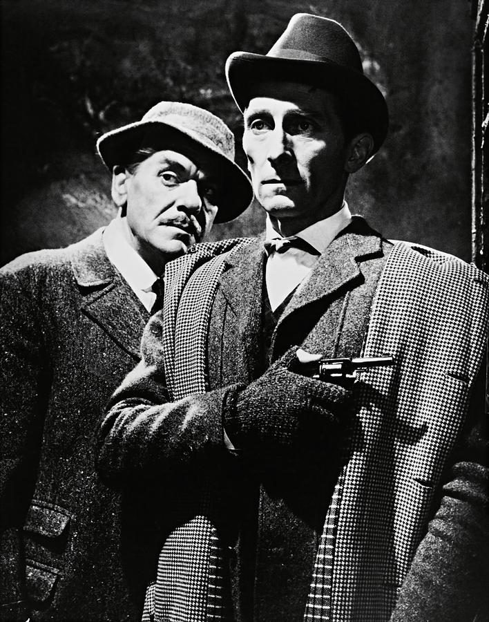Sherlock Holmes Photograph - PETER CUSHING and ANDRE MORELL in THE HOUND OF THE BASKERVILLES -1959-. #1 by Album