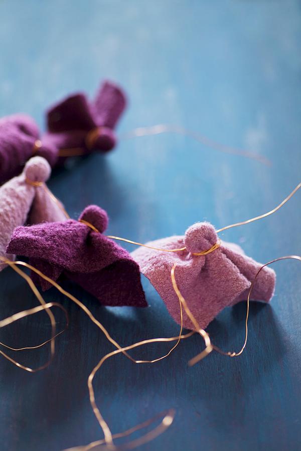 Pieces Of Felt In Berry Shades Tied With Copper Wire #1 Photograph by Alicja Koll