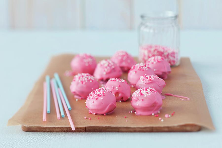 Pink Cake Pops On A Piece Of Baking Paper #1 Photograph by Rua Castilho