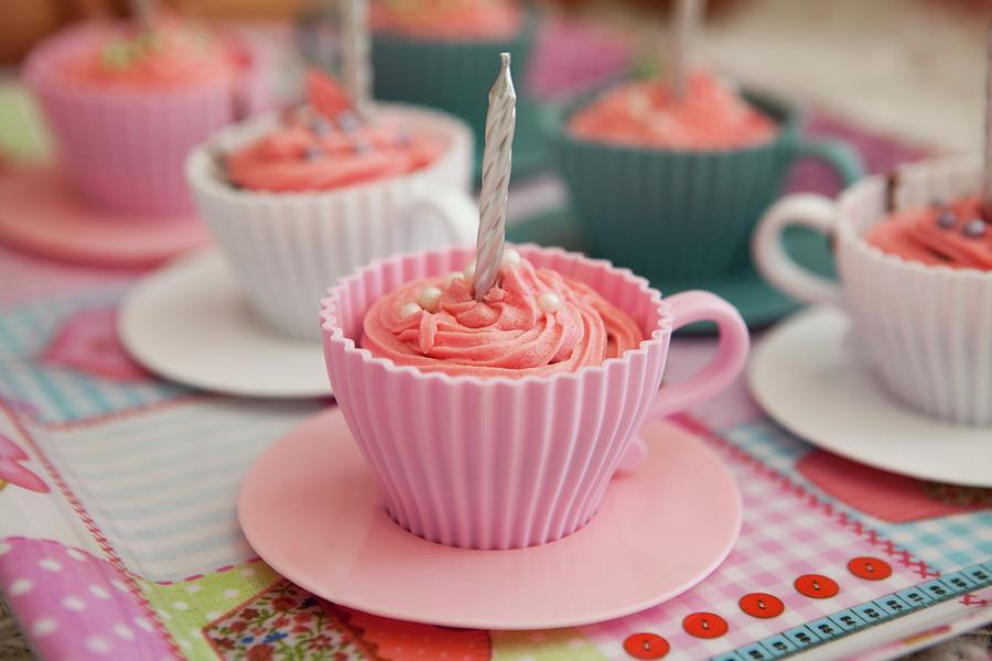 Pink Cupcakes With Birthday Candles Served In Cups Photograph by ...