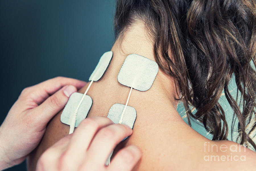 Placing Tens Electrodes On Neck Photograph by Microgen Images/science Photo Library Pixels