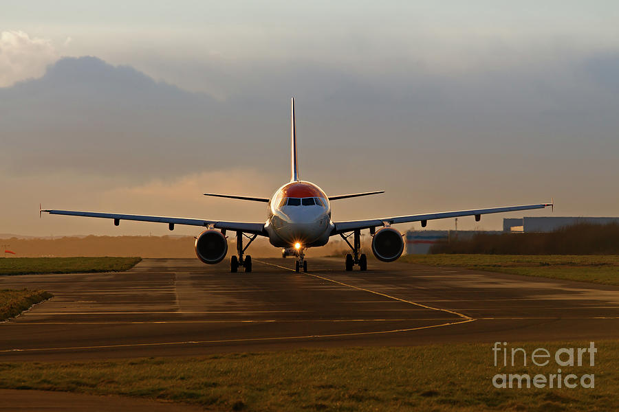 Plane Taxiing Photograph by Ken Biggs - Fine Art America